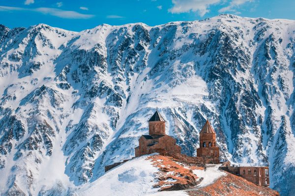 Gergeti Trinity Church with Kazbek Mountains in the background